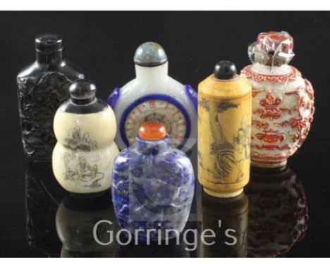 Six Chinese snuff bottles, in various materials, 19th / 20th century, the first moulded in porcelain with Buddhist emblems, a