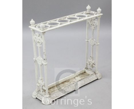 A late Victorian white painted cast iron stick stand, 2ft