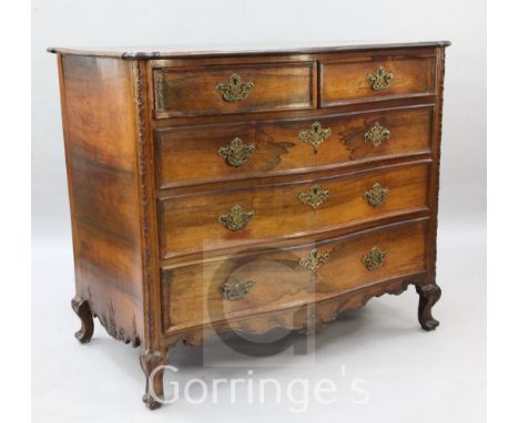 A 19th century Indo Portuguese rosewood serpentine commode, fitted two short and three long drawers, on scroll feet, W.4ft 1i