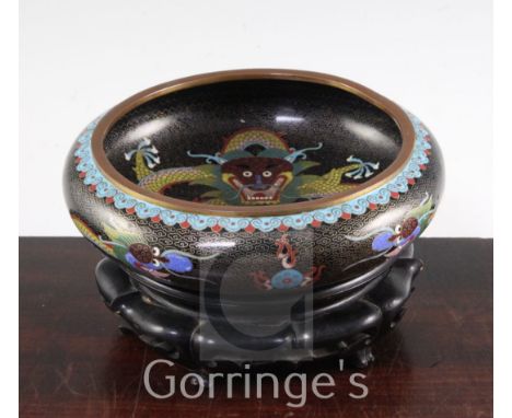 A Chinese cloisonne enamel 'dragon' shallow bowl, Ming mark, early 20th century, the exterior decorated with two confronting 
