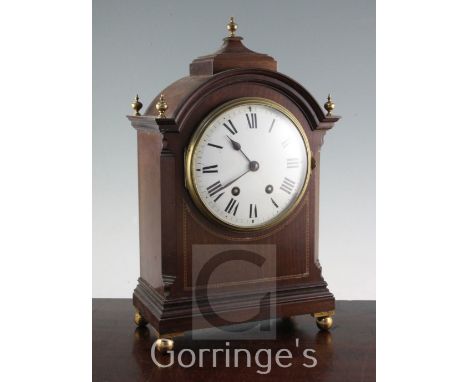 An Edwardian inlaid mahogany mantel clock, with French movement, 16in.