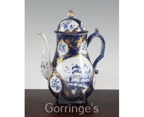 A Worcester powder blue ground coffee pot and cover, c.1760-70, decorated with the 'Fisherman in Fan Shaped Panel' pattern an