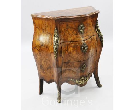 A Dutch walnut and marquetry serpentine bombe commode, with three drawers, W.2ft 5in.