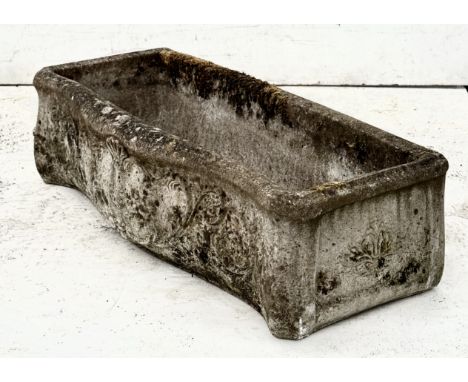 A&nbsp;well weathered composite stone garden serpentine garden trough - with cast foliate and shell cartouche decoration, 74 