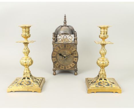 A 20th century brass lantern clock - original mounting removed and replaced with modern quartz battery movement, in working o