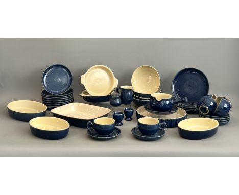 A collection of Denby dinner and over-to-table ware in a mottled dark blue and cream glaze - including a 9&frac12;in flan dis
