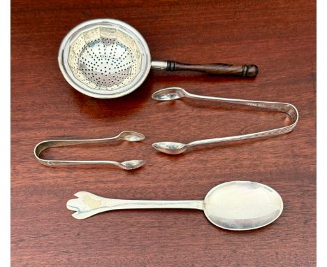 Four small pieces of silver: 1. a trefid spoon - Francis Higgins & Son, London 1930, reeded rat-tail and flame terminal 23g; 