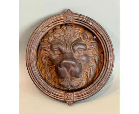 An unusually large 19th century style cast iron lion door knocker - with circular reeded handle with foliate and tablet motif