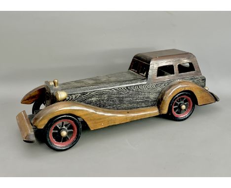 A handmade wooden model of a vintage car - third quarter 20th century, the Bentley-style sports coupe in stained oak and beec