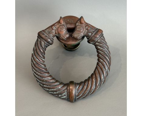 A bronze Celtic style door knocker - second half 20th century, in the form of a torc style bangle, with beast terminals and s