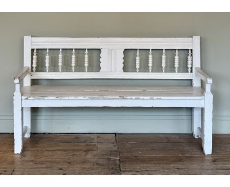 A 19th century painted pine bench - the channel moulded back with a single shaped splat and bobbin turned spindles, over a pl