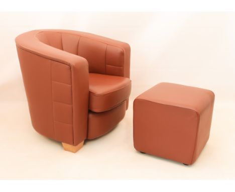 An Art Deco style dark tan leather tub armchair and matching square footstool - the chair with tapered square beech wood feet