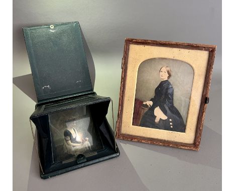 Two late 19th century colour portrait photographs - one by Heath of Plymouth, the glass negative housed in a green morocco le