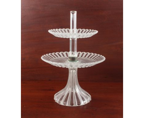 A mid-20th century Baccarat moulded glass clear and frosted glass two-tier cake stand - with two graduated, scalloped tiers w