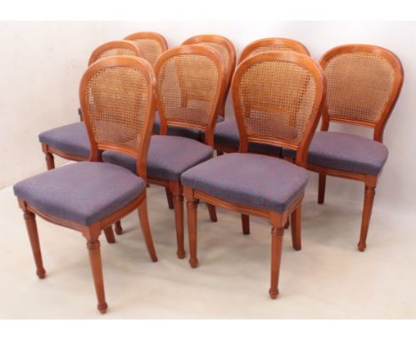 A set of eight cherrywood balloon back dining chairs by Grange - with metal maker's plaque to back of seat rails, the stuff o
