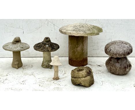 Five mushroom style garden ornaments - including a shallow staddle stone top, on a cylindrical sandstone column stand (both p