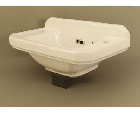 An unused cloakroom white china sink by Victoria Plumbing (LWH 51 x 31.5 x 16.5cm excluding pipe)