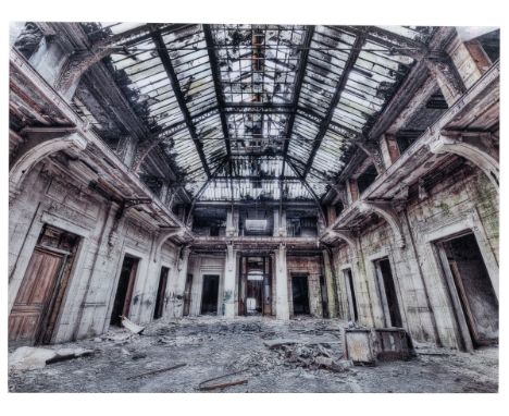 A photograph of an abandoned French interior The image depicting the abandoned Bureau Centrale office building at the Florang