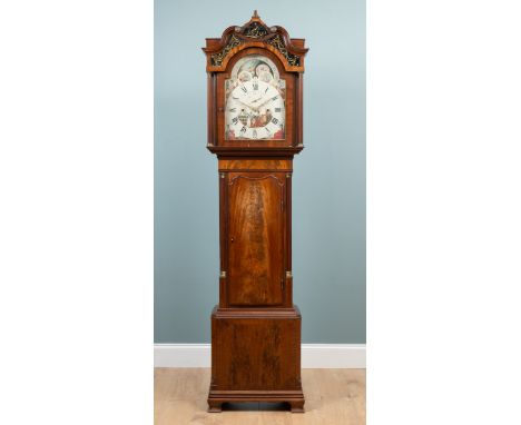 A George III quarter-chiming longcase clock by Thomas Richardson of Weverham  The mahogany case with a swan neck pediment and