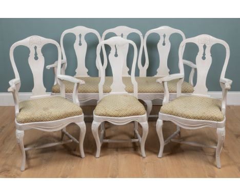 A Scandinavian painted chair-backed three-seater sofa and three further chairs The sofa with pierced splats, scroll terminate