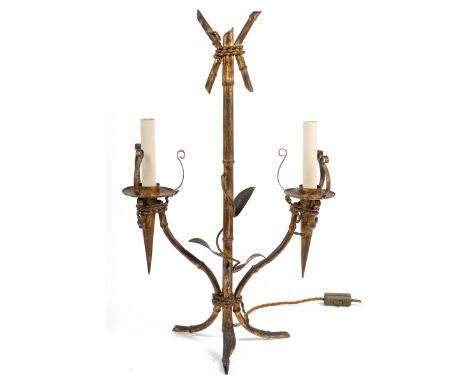 A 20th century gold-painted iron table lamp Modelled as shooting bamboo, with twin branches70cm highQty: 1Losses to the paint