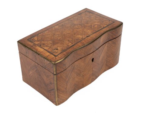 A 19th century French parquetry tea caddy With a serpentine front and brass mounts. The hinged lid opening to reveal a lined 