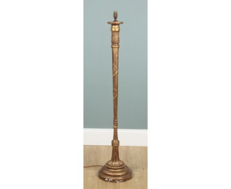 An Italian gilt-painted wooden standard lamp With a bound column support and acanthus leaf moulding to the top, raised on a s