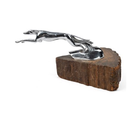 Ford Lincoln Greyhound Mascot Mounted on a chock of wood, the mascot inscribed to the underside 'Franklin Diecasting Co. Inc.