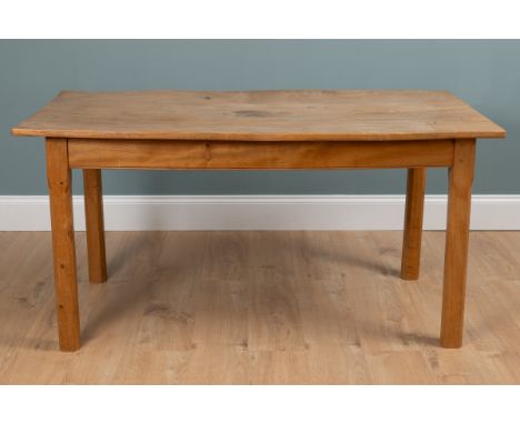A 20th century elm-topped kitchen table Made by Martin Dodds.152cm wide x 78cm deep x 76cm highQty: 1Wear commensurate with a