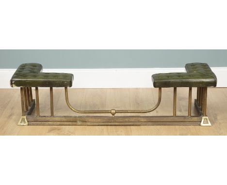 A brass breakfront adjustable fender With a green faux leather button-upholstered top.144cm wide x 43cm deep x 35cm highQty: 