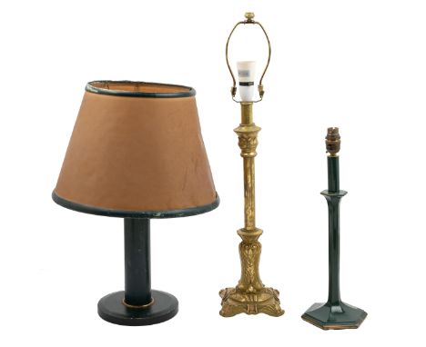 A collection of three table lamps A gold-painted table lamp with leaf moulded decoration on a square base; a hexagonal green-