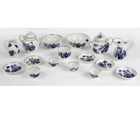 An 18th century Worcester first period 'Three Flowers' pattern porcelain tea service Two tea pots; a milk jug; a sparrow-beak