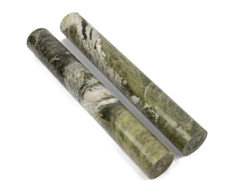 A pair of turned Connemara column supports Possibly from a pair of table lamps.45cm high x 6.3cm diameterQty: 2Some light chi