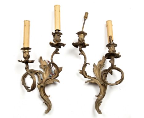 A pair of 19th century gilt brass two-branch wall brackets Of scrolling foliate form.50cm high.Qty: 2Paint residue throughout