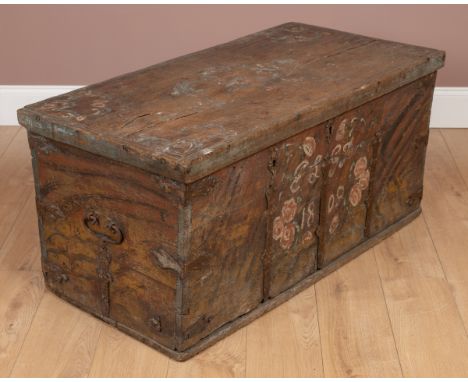 An antique painted pine Swedish trunk The trunk with scumbled style ornament, iron carrying handles to the side, and floral d