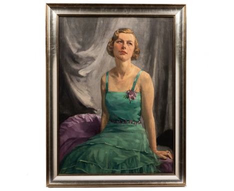 Thomas Alfred West (British 1864-1947) A portrait of a young woman in a green dress, oil on canvas, signed and dated lower ri