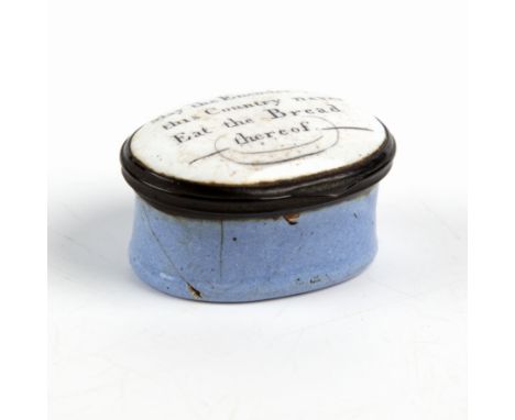 An enamel snuff box The top baring the words 'May the Enemies of this country never Eat the Bread thereof'.4cm wide x 3.5cm d