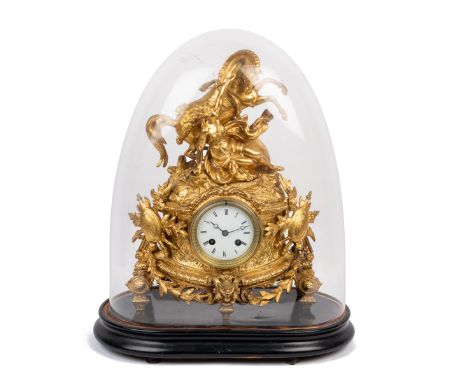 A French gilt metal mantel clock The French mantel clock with white enamel Roman dial, Japy bell striking movement, the case 