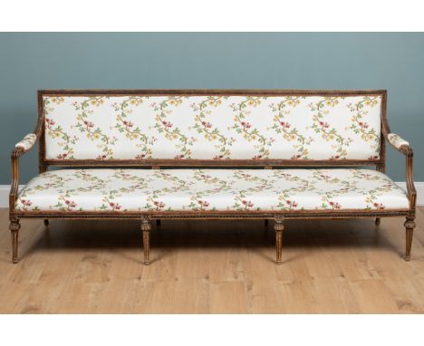 A 19th century Swedish sofa The carved frame of Neoclassical form with upholstered back arms and seat, bands of classical orn