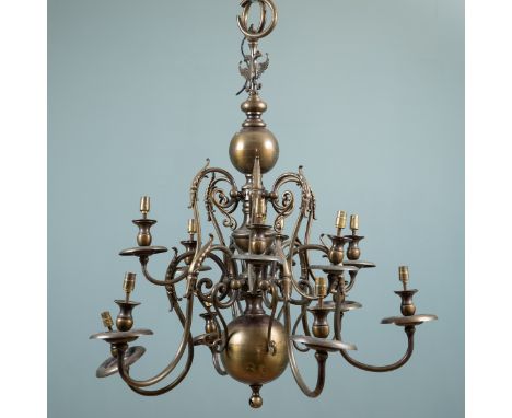 An 18th century Dutch style chandelier or electrolier The brass hanging light fitting with two tiers of six scrolling branche