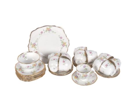 An early Royal Albert, circa 1930s, part tea service, hand and transfer painted floral decoration, with gilded finish 