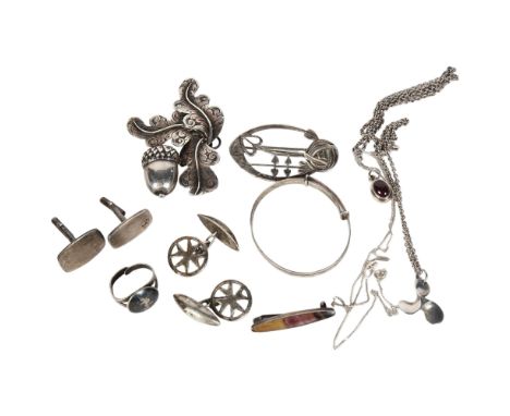 A collection of various silver jewellery, including a scrolled floral and acorn brooch, an Art Nouveau design brooch, a baby'
