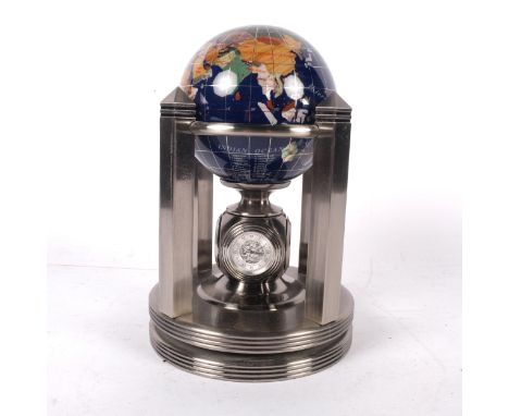 A 20th century terrestrial globe desk-top clock set, Meridian Collection "Unan", on fitted revolving stand, H21cm 