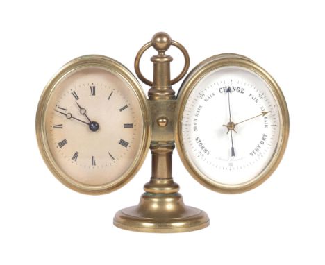 A brass-cased combination desk clock and aneroid barometer, on turned stand, H11cm, complete with key, currently in working o