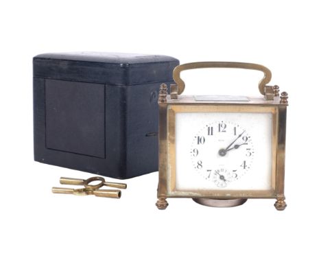 A French brass carriage clock by Maine, cased with 2 keys, W10cm 
