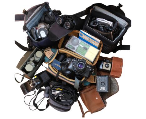 A quantity of Vintage hand-held camcorders, cameras and other associated equipment, including a JVC 700X digital zoom hand-he