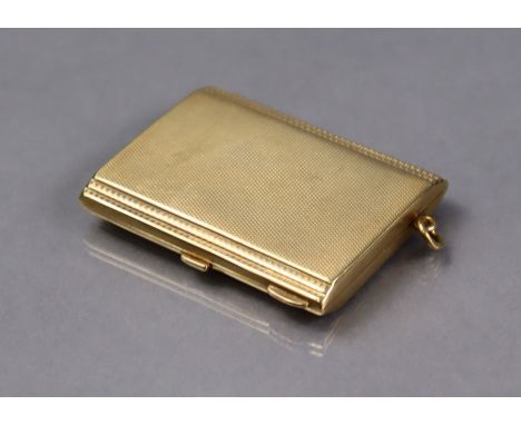 A 9ct gold engine-turned rectangular match-book case, Birmingham 1937 by B.H. Britton &amp; Sons (38.8g).