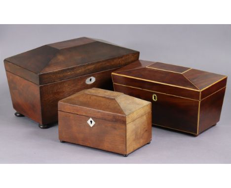 A Victorian mahogany tea caddy of sarcophagus form with glass liner &amp; two lidded compartments, 13” wide x 7¾” high x 7” d