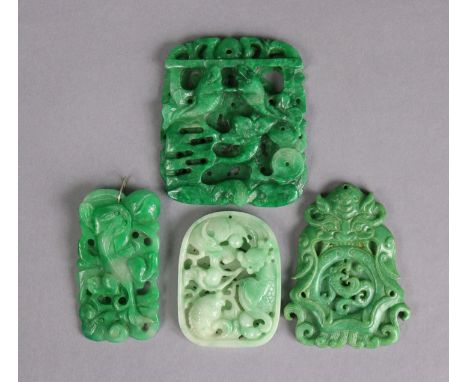 A collection of eight various Chinese jade pendants, 3½” x 5¾” &amp; smaller.