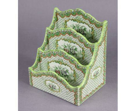 A pottery three-division letter rack retailed by Thomas Goode &amp; Co, with green transfer-printed decoration, probably by S